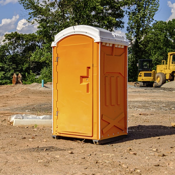 how often are the porta potties cleaned and serviced during a rental period in Three Points